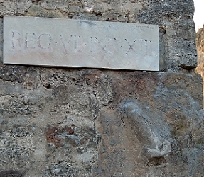 October 28, 2013<br>Penis sign on the wall in Pompeii. Brothel down the street.